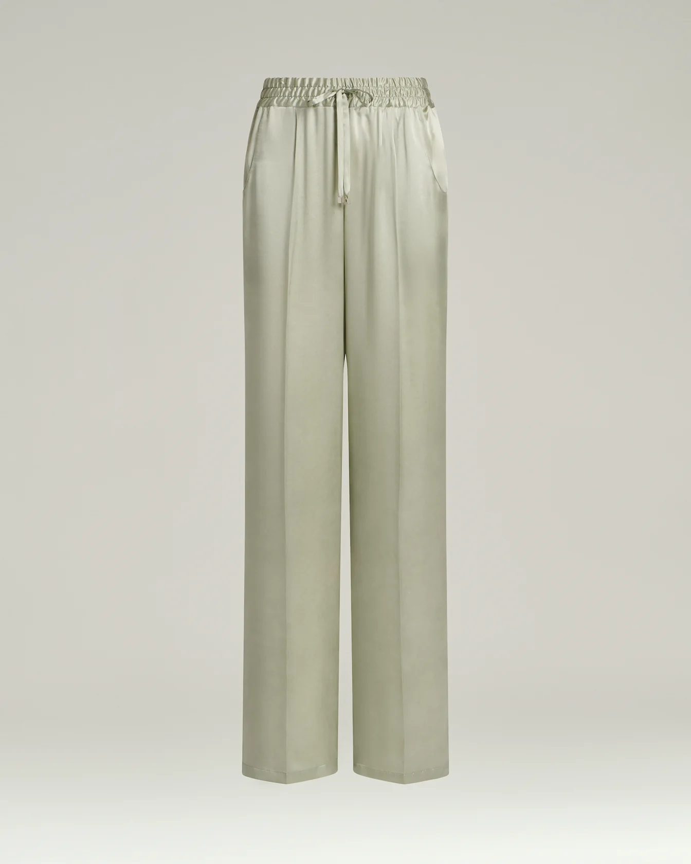 FLUID SATIN TROUSERS IN GREEN SILK